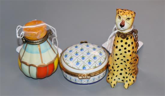 A Limoges pill box modelled as a cheetah, another box modelled as a hot air balloon and a Del Prado pill box